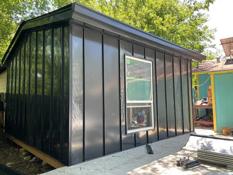 Black standing seam metal wall panels for Metal Roof Installation in Triangle