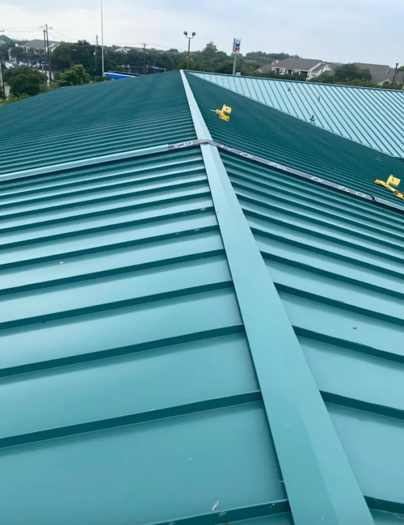 Green commercial metal roof ridge and valley for Metal Roof Repair in Triangle